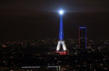 The Eiffel Tower lit up in the colours of the French flag following the attacks of 13 November 2015.