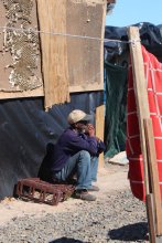 Former Richwood informal settlement resident sitting in contemplation