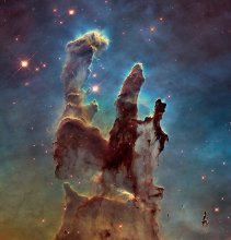 The "Pillars of Creation"—interstellar gas and dust in the Eagle Nebula—as taken by the Hubble Telescope