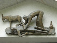 Statuette of the Good Samaritan tending the injured man