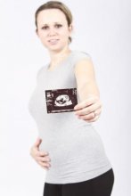Pregnant woman with scan picture