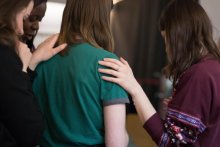 Women praying together