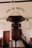 "God is Liefde" above a pulpit