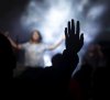 Hand raised during a praise and worship session