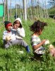 Children enjoying bread and soup on a sunny winters day